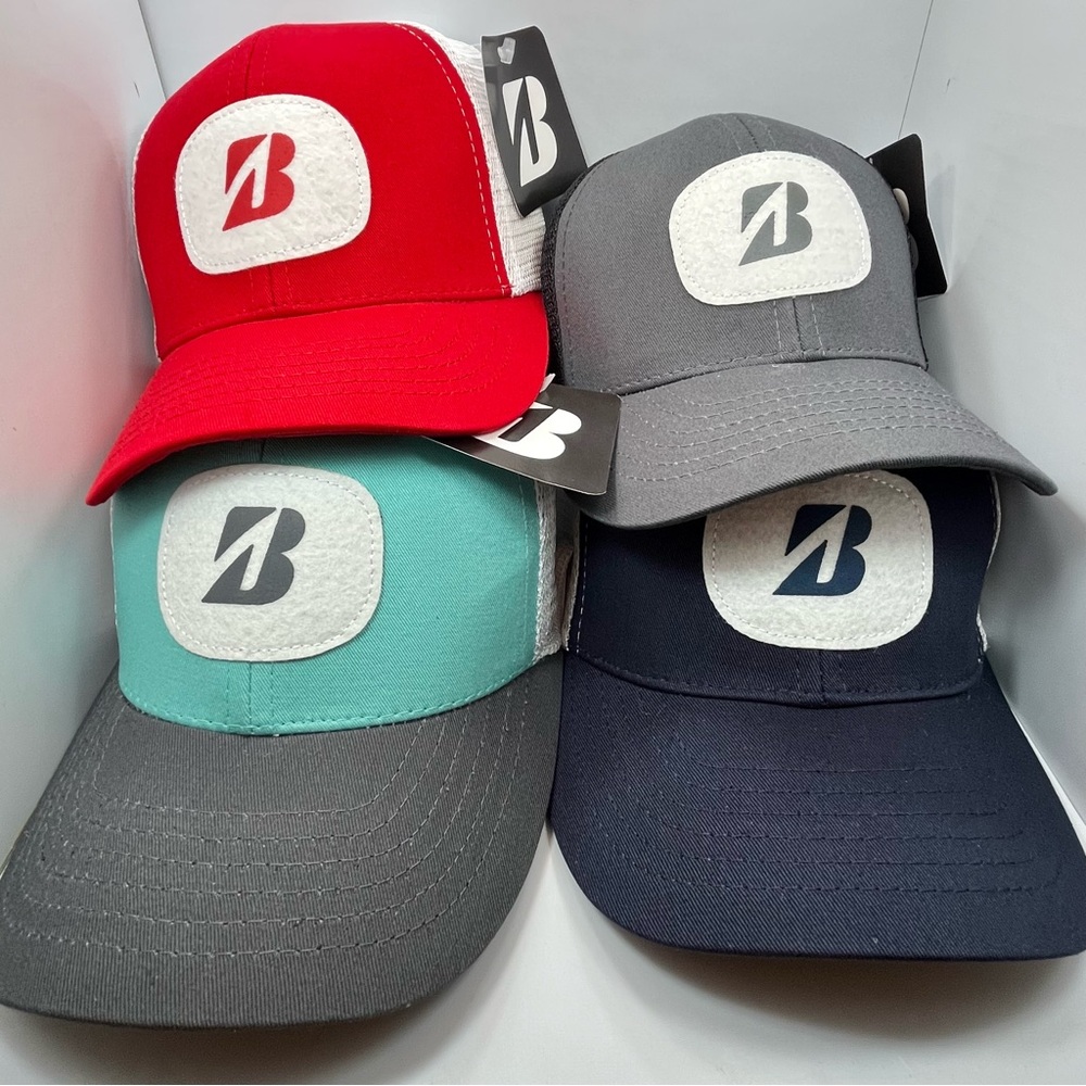 4 pack NWT Bridgestone golf hats mesh trucker